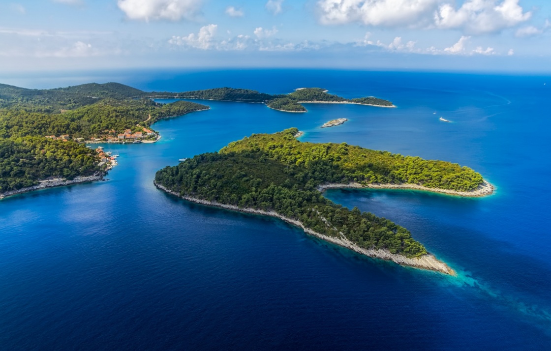 'Aerial helicopter shoot of National park on island Mljet, village Pomena, Dubrovnik archipelago, Croatia. The oldest pine forest in Europe preserved.' - Dubrovnik